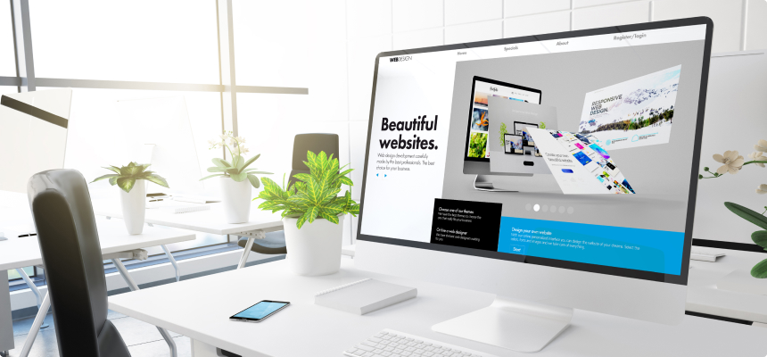 a monitor showing web designs