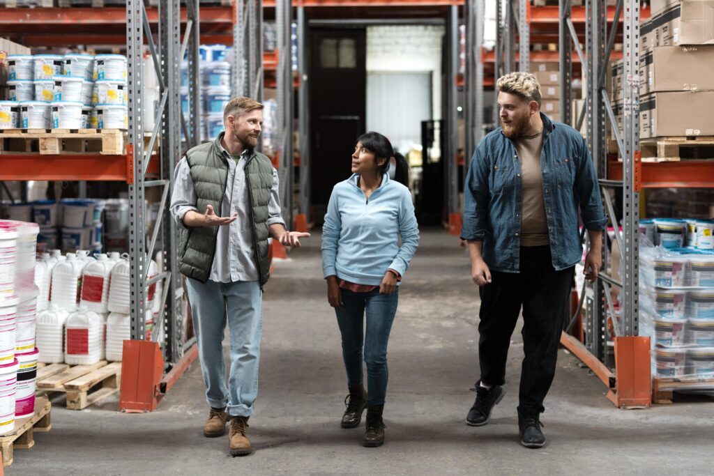 two people discussing on stock replenishment in retail