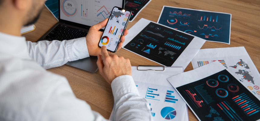 a person watching phone and browsing Methods of Demand Forecasting